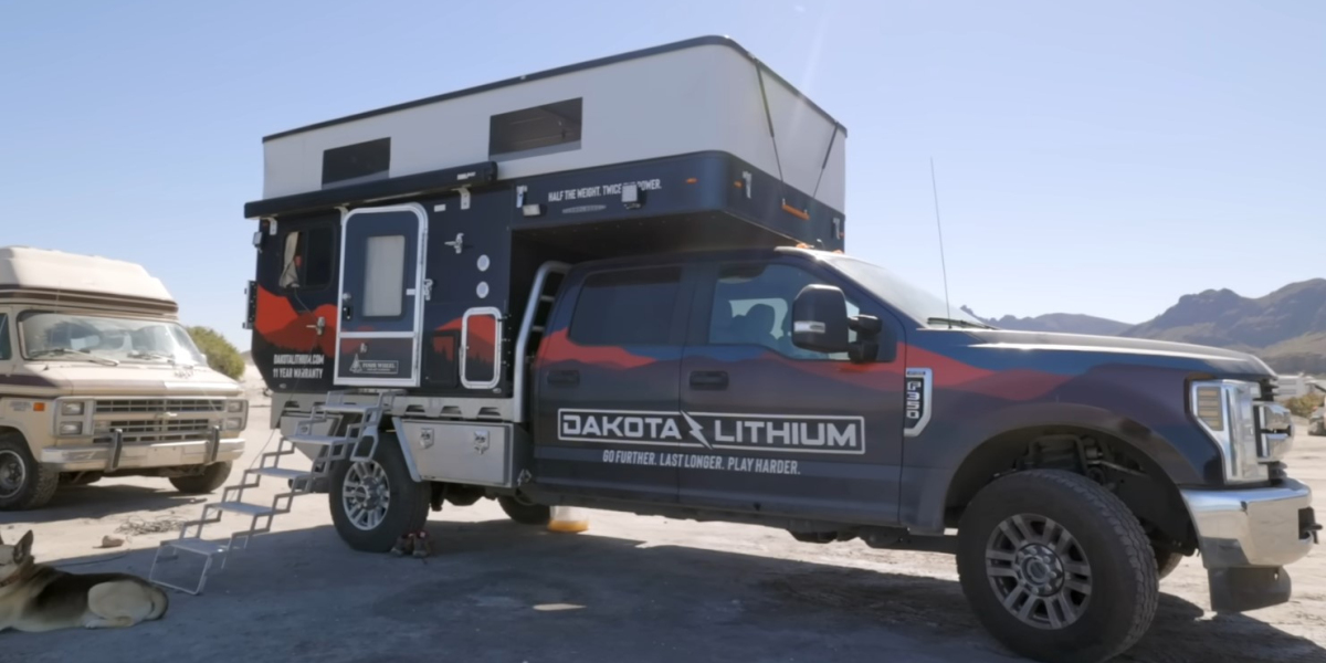 Can I use a regular automotive battery charger to charge my RV batteries?