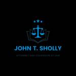 John T Sholly
